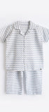Baby romper with zigzag pattern on a white background
